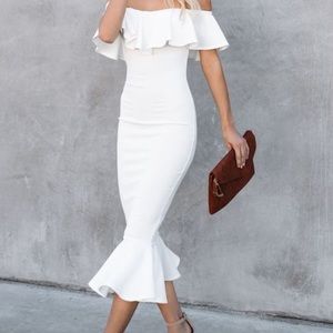 Mid length white off-shoulder dress. Never been worn. Size Large.